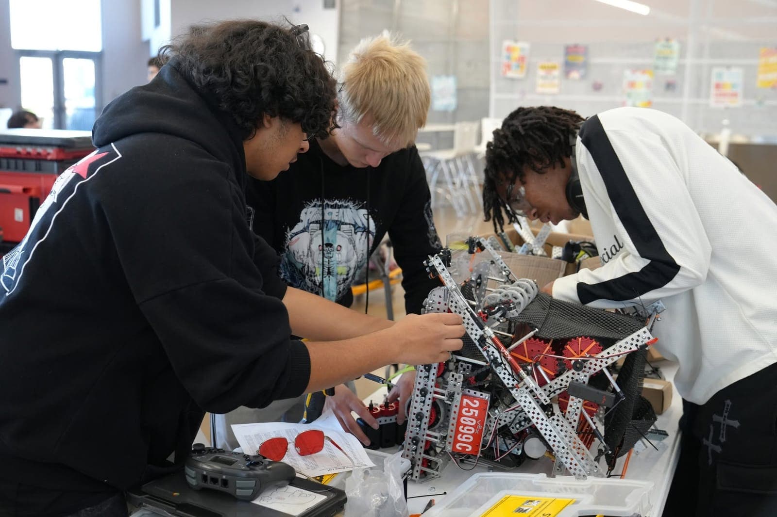 Highland Prep West VEX Robotics team building and competing